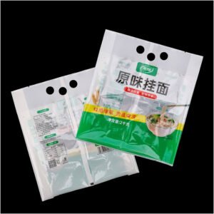 Foil laminated center seal biscuit bag with a hang hole for pegboard retail display